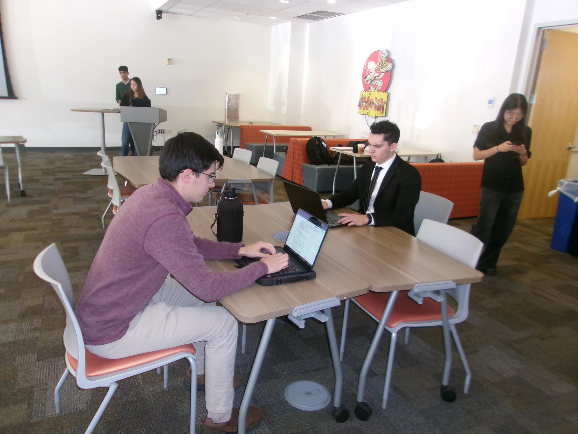 AMI team members preparing for the December 2025 pitch competition