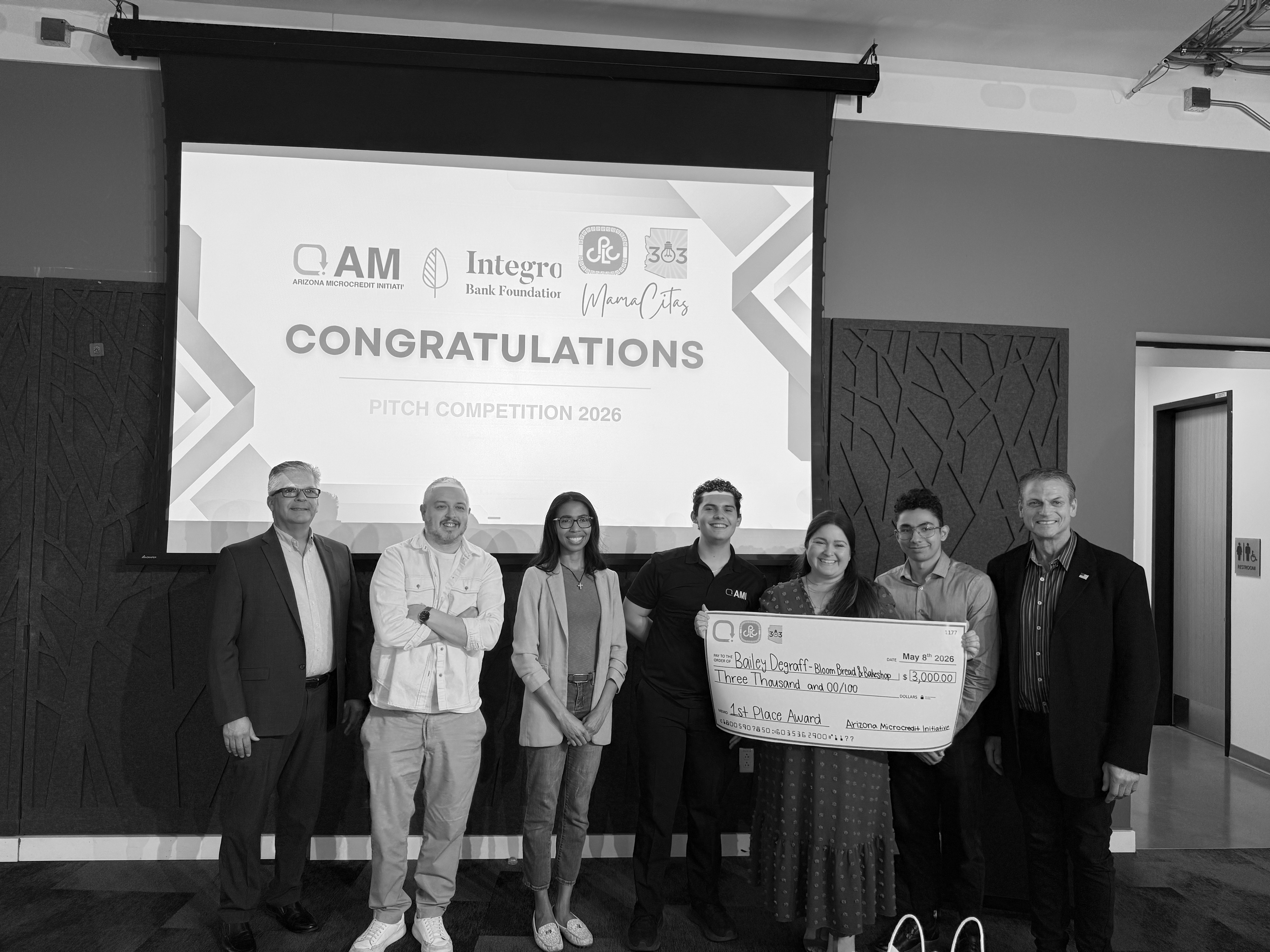 Entrepreneurs and community members at an AMI pitch competition